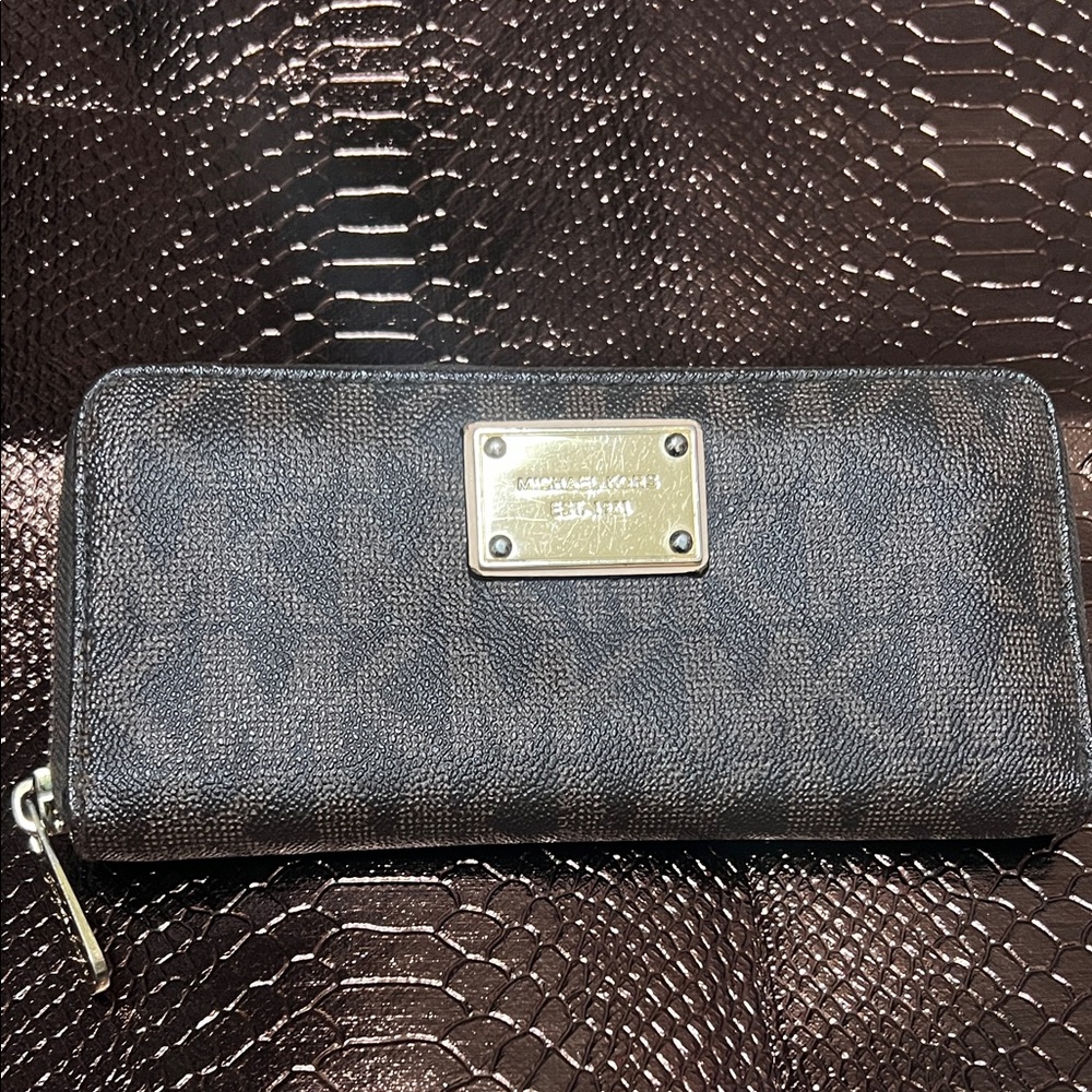 Michael Kors zippered wallet.